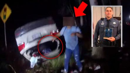 Momento En Que Policía Levanta Un Carro Luego De Un Choque, Para Ayudar A Mujer Que Estaba Atrapada