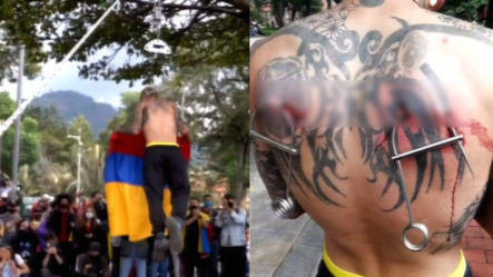 Tatuador Colombiano Se Cuelga De Su Piel Para Hacerle Un Llamado A Su Gobierno 