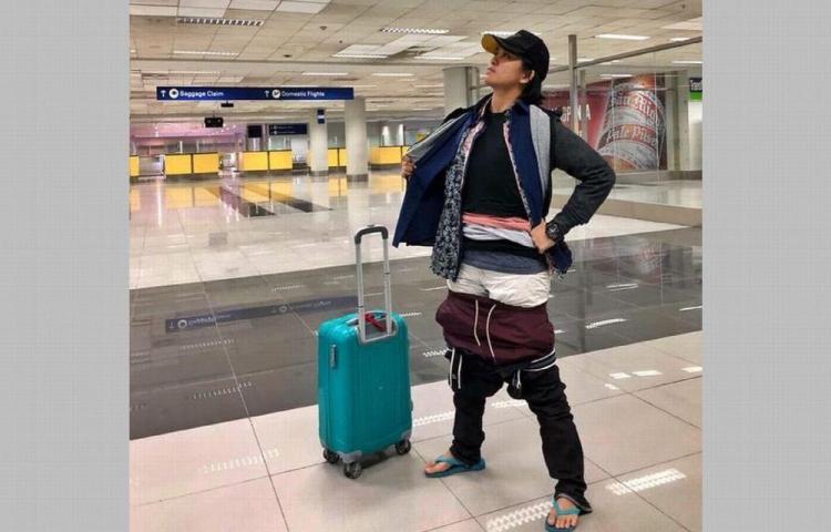 La Maleta Tenia Sobrepeso Pues Ella Se Puso La Ropa Que Llevaba Extra Y Pudo Evitar Pagar De Mas