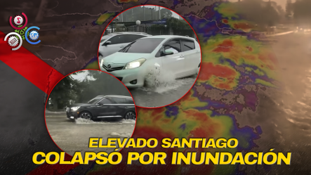 Lluvias Provocan Inundación En El Elevado De La 27 De Febrero; Dos Vehículos Quedan Varados