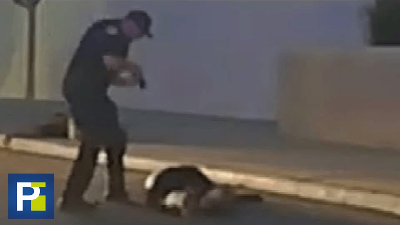 Policía Patea A Un Sospechoso Tendido En El Piso Que No Muestra Resistencia